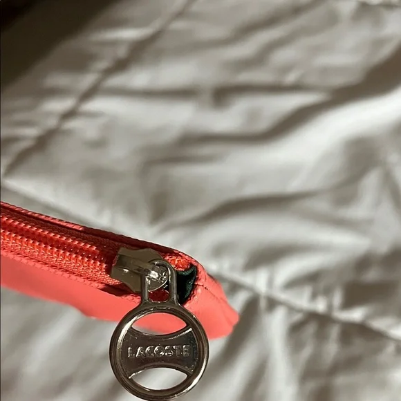 Coral color Lacoste Women's Vibrant Coral Wristlet - Picture 2 of 5